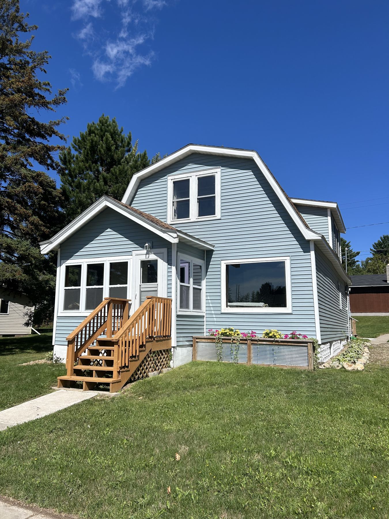 Front exterior of the house on a bright summer day
