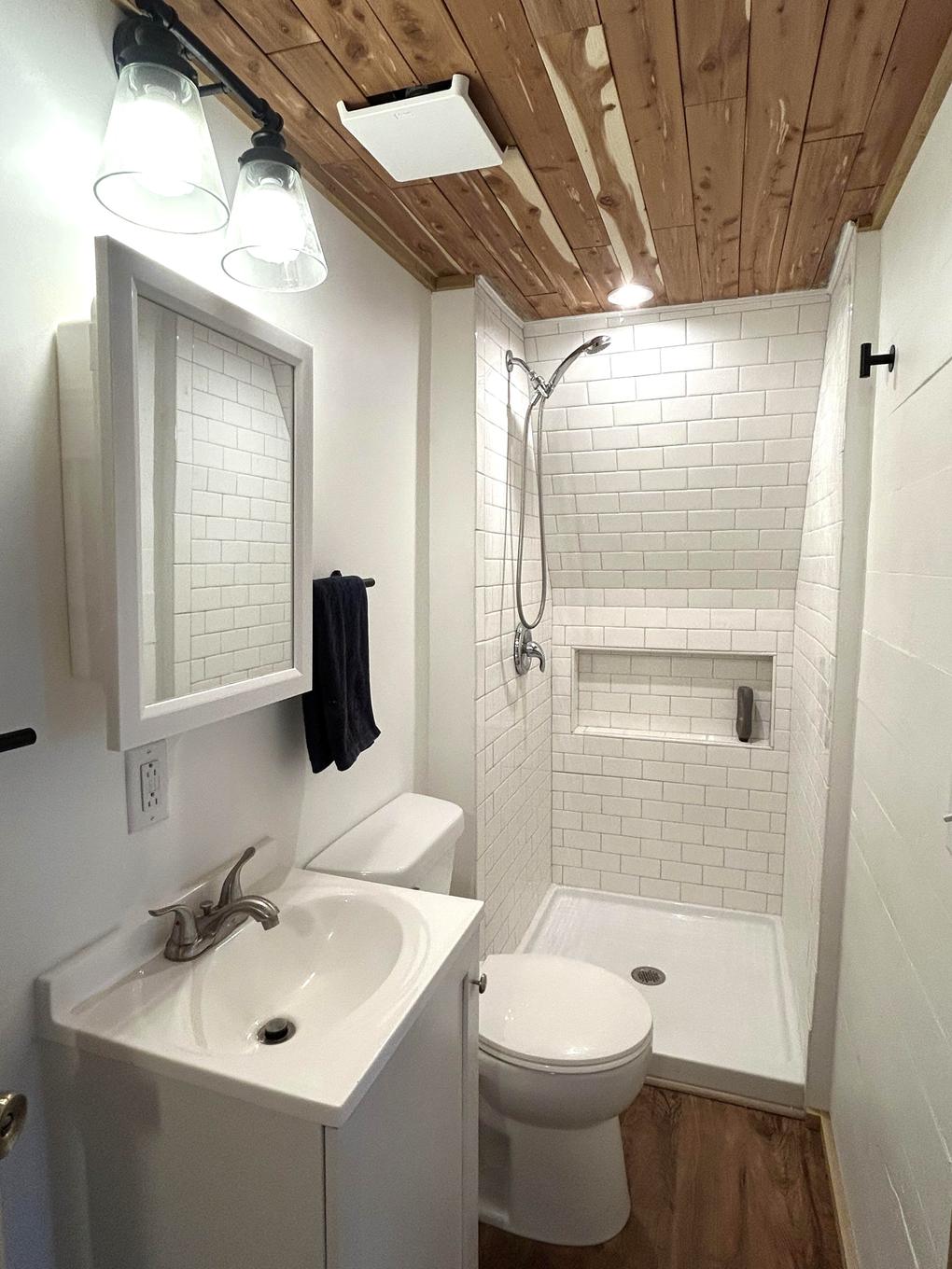 Bathroom with white subway tile shower