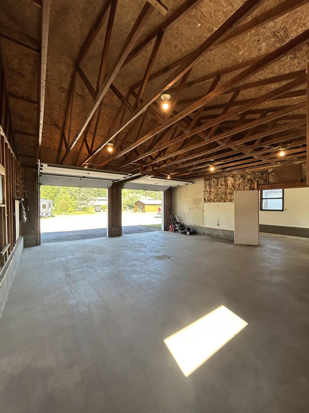 Attached garage and workshop, framed and unfinished