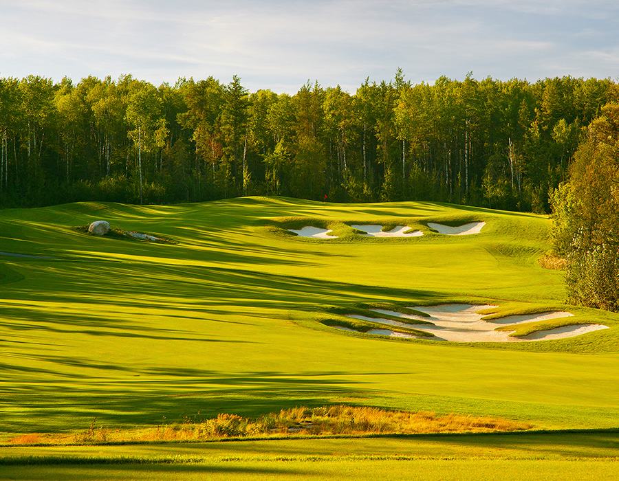 A fairway and bunkers at the Giant's Ridge golf course in summer